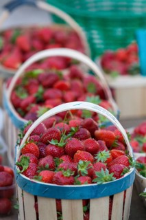 Market stall with fresh strawberries