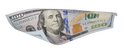 One hundred dollar bill falling or floating on empty background
