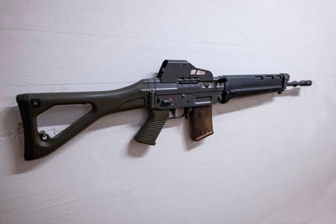 New Modern Machine Gun Hanging on a Wall in Switzerland