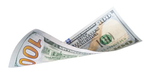 One hundred dollar bill falling or floating on empty background