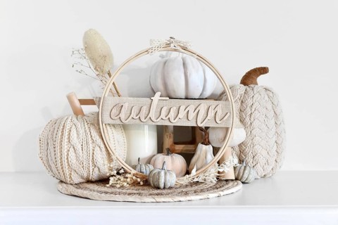 Boho style autumn decor with pumpkins and dried flowers