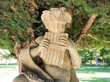 Statue of the shepherd god Pan in the Court Garden
