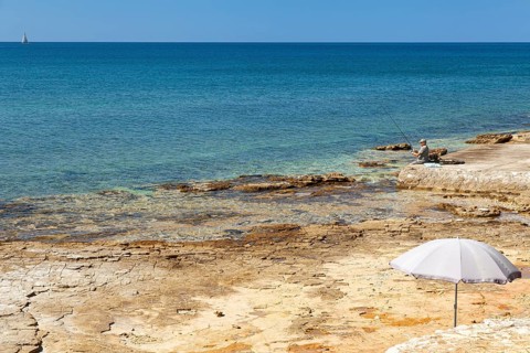 Beach on the stone coast of Beach Kastanija