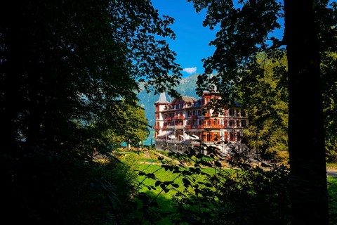 The Historical Grandhotel Giessbach on the Mountain Side in Giessbach