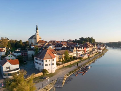 Riverbank promenade and town aerial view