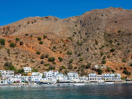 The car-free Loutro below a rocky mountain