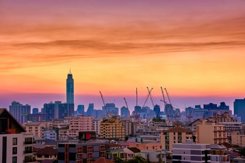 Colorful sunset over big city