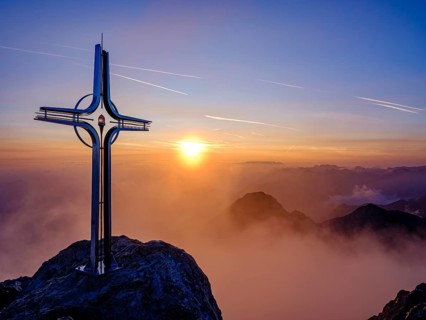 Summit cross Hoher Goell at sunrise