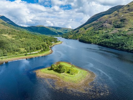 Aerial view of the eastern part of the freshwater loch Loch Leven with a small island