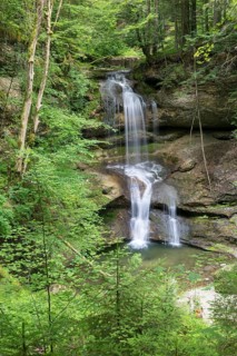 Mountain stream with waterfall a sight in Scheidegg
