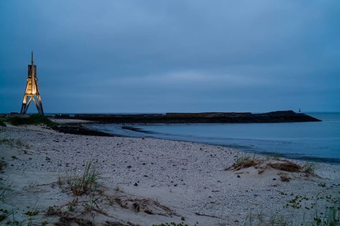 Kugelbake illuminated at dusk
