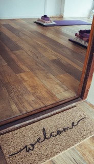 Welcome coir doormat outside a Yoga Studio