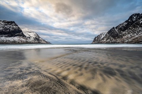 Sandy beach beach with mountains