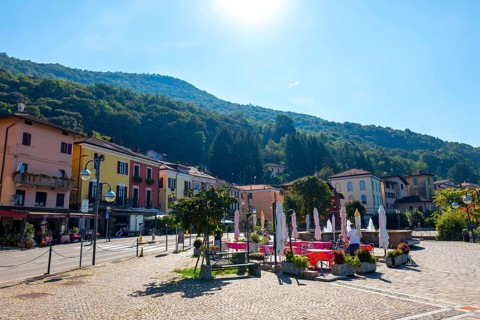 City of Porto Ceresio and Sunlight in a Sunny Summer Day in Porto Ceresio