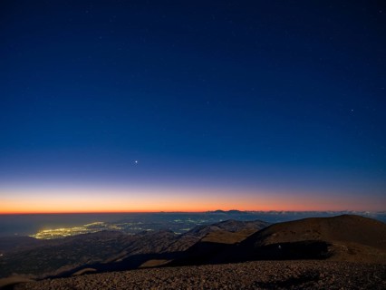 Dawn over Heraklion under starry sky