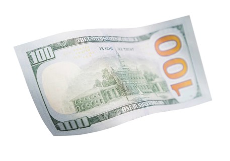 One hundred dollar bill falling or floating on empty background