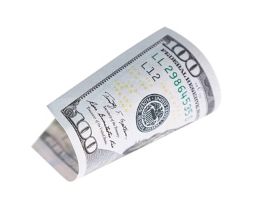 One hundred dollar bill falling or floating on empty background