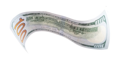 One hundred dollar bill falling or floating on empty background