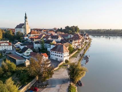 Riverbank promenade and town aerial view