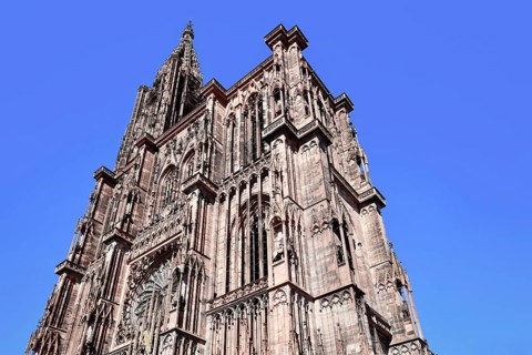 Tower of famous Strasbourg Cathedral in France in romanesque and gothic architecture style