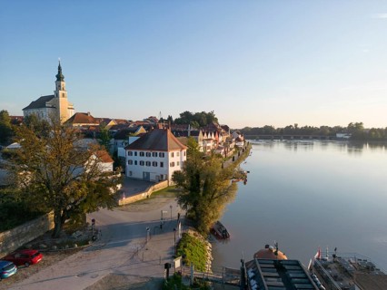 Riverbank promenade and town aerial view
