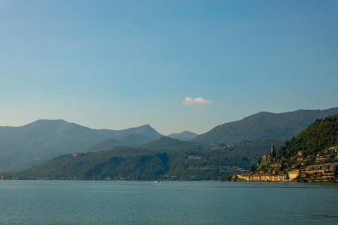 Lake and Mountain View over Morcote in a Sunny Summer Day on Lake Lugano in Morcote