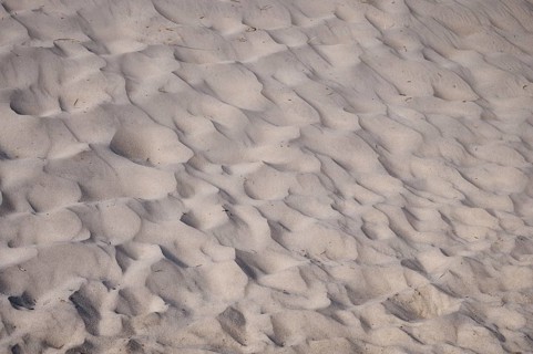Waves in the sand on the beach near Henne Strand