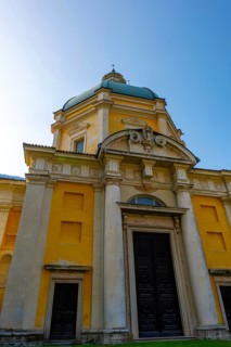 Temple of the Holy Cross Against Blue Clear Sky in a Sunny Day in Riva San Vitale