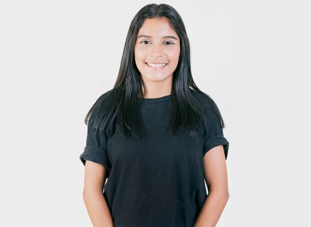 Portrait of happy Young girl with serene look isolated. Portrait of attractive latin girl smiling isolated. Nicaraguan woman concept in isolated background