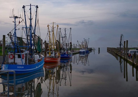 Evening atmosphere in the cutter harbour of Dorum-Neufeld