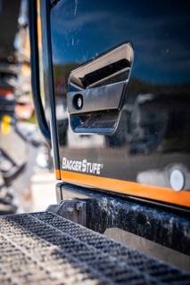 Excavator step on black Liebherr crawler excavator
