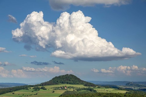 View of the Hohenhewen with clouds in the Hegau