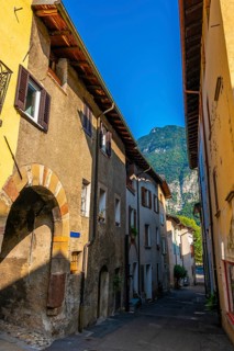 Old City Street and Mountain Peak in a Sunny Day in Riva San Vitale
