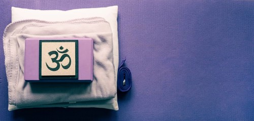 High angle view of yoga equipment. Yoga mat