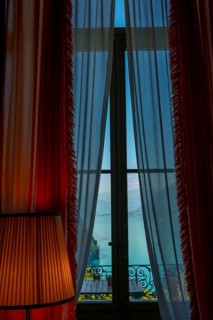 Window View from The Historical Grandhotel Giessbach with View over Mountain and Lake Brienz with Sunlight in Giessbach