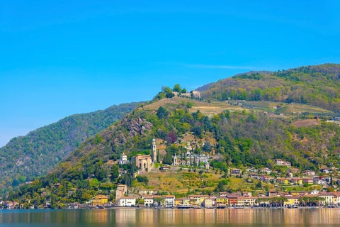 Alpine Lake Lugano with Mountain in a Sunny Day in Village Morcote