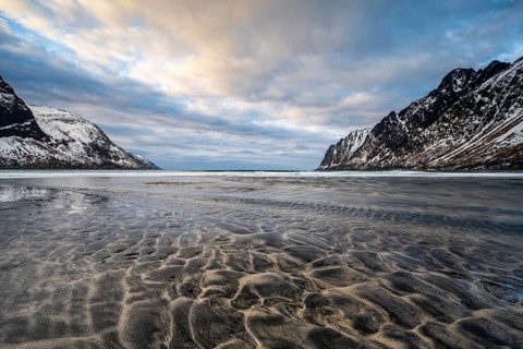 Sandy beach beach with mountains