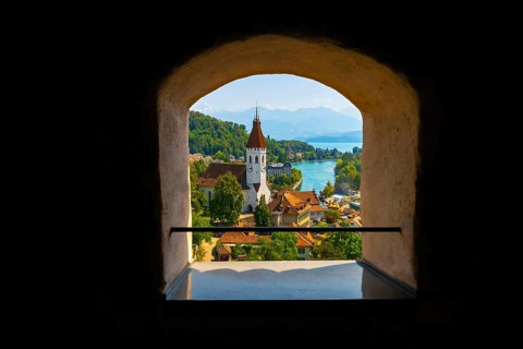 WindowView over City of Thun and Lake with Mountain in a Sunny Day in Thun