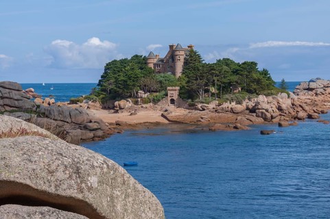 Rocky coast and Costaeres Island with Costaeres Castle