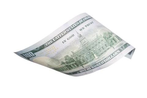 One hundred dollar bill falling or floating on empty background