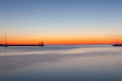 Sunset at the port entrance of Porec