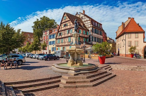 Place des 6 Montagnes Noires and Roesselmann Fountain in Colmar in Alsace