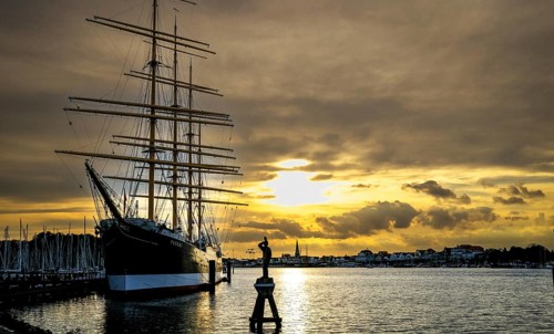 Museum sailing ship Passat at sunset in Priewall harbour