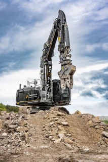 Black Liebherr crawler excavator recycling on demolition site