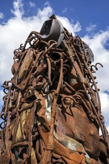 Compressed and twisted metal of WWI remnants like rifles