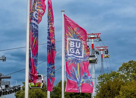 Flags and cable car above the grounds of the Federal Horticultural Show