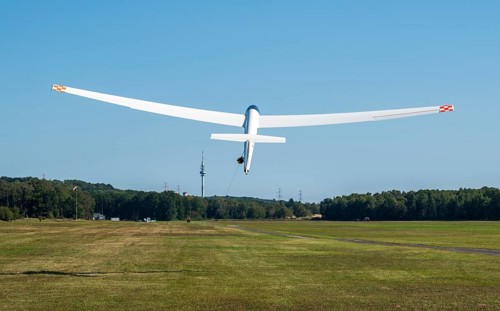 Glider type ASK23 in winch launch in Hamburg Boberg
