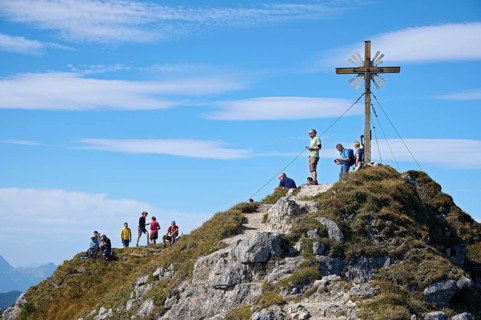 Hiker at the summit of the Grosse Klammspitze