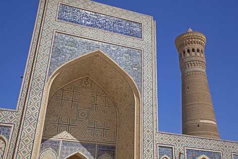 Tiled Iwan portal and minaret of the Kalyan Mosque