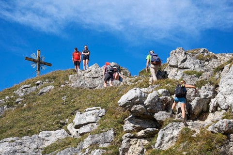 Hiker at the summit of the Grosse Klammspitze